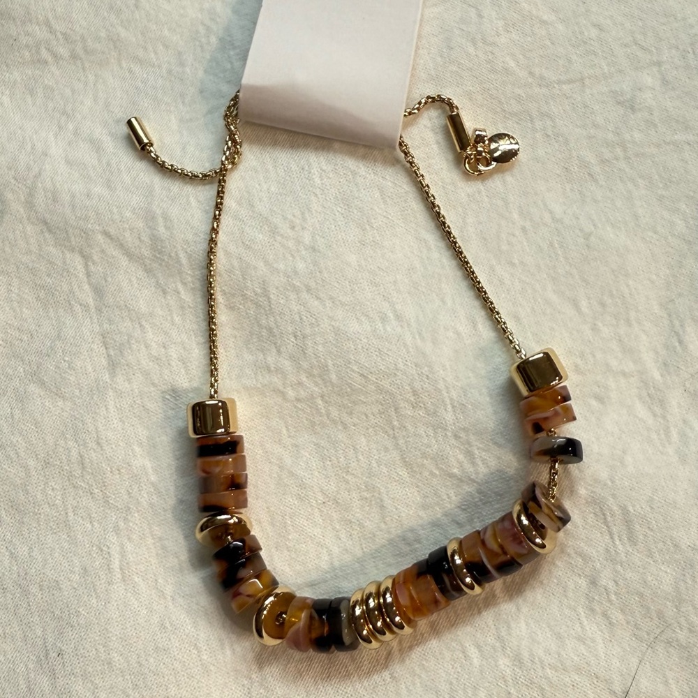 LOFT Gold, tortoise pink spliced pull tie bracket